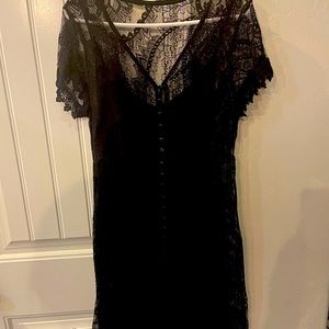 Black, short lace torrid dress with tank dress underneath. Size 1x